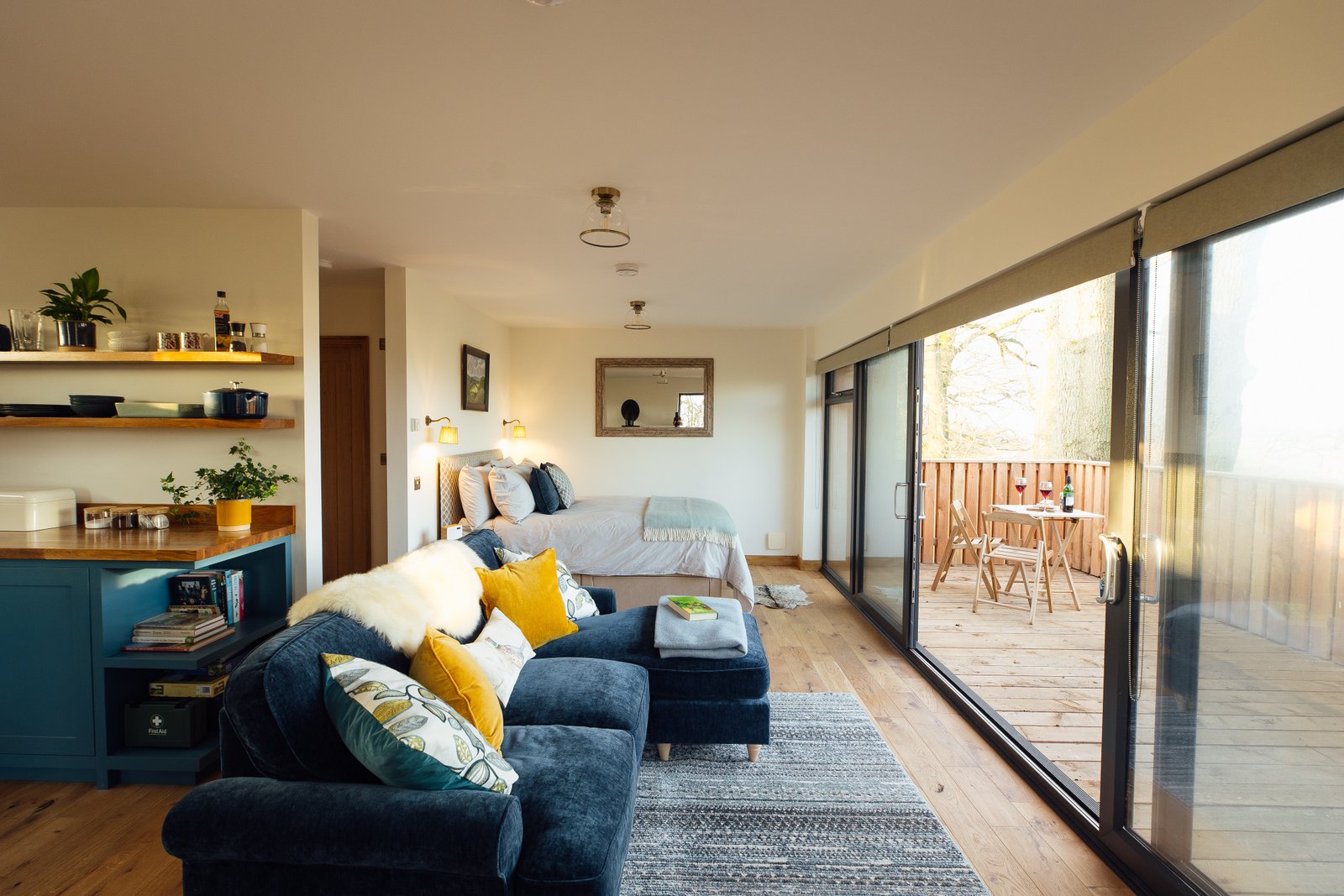 Warm cabin interior with the bedroom and sitting area